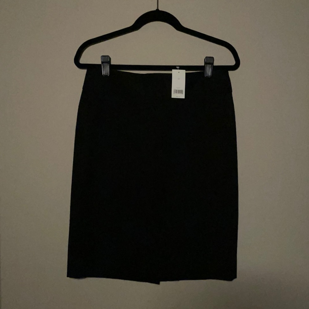 TAGS ON BLACK PENCIL SKIRT
